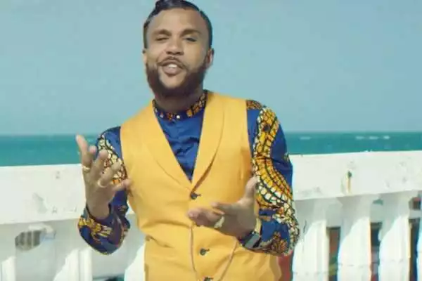 Jidenna Shares Photo Of Himself Posing Infront Of His Poor Looking Childhood Home In Enugu